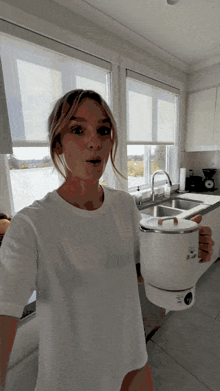 The compact kettle in use on a desk